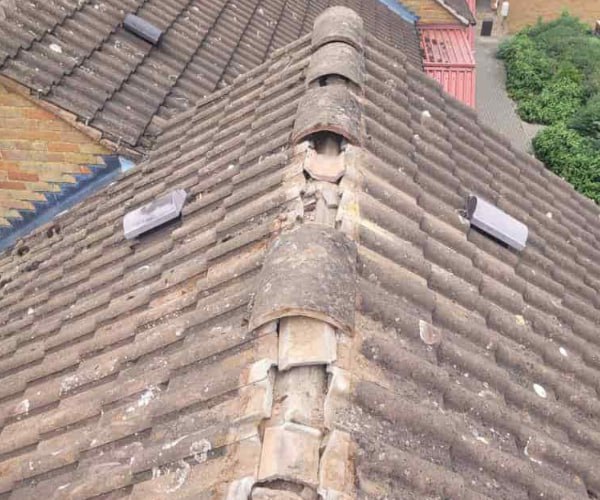 This is a photo if a roof ridge which has missing tiles. The ridge tiles are being replaced by ATY Roofing Mexborough